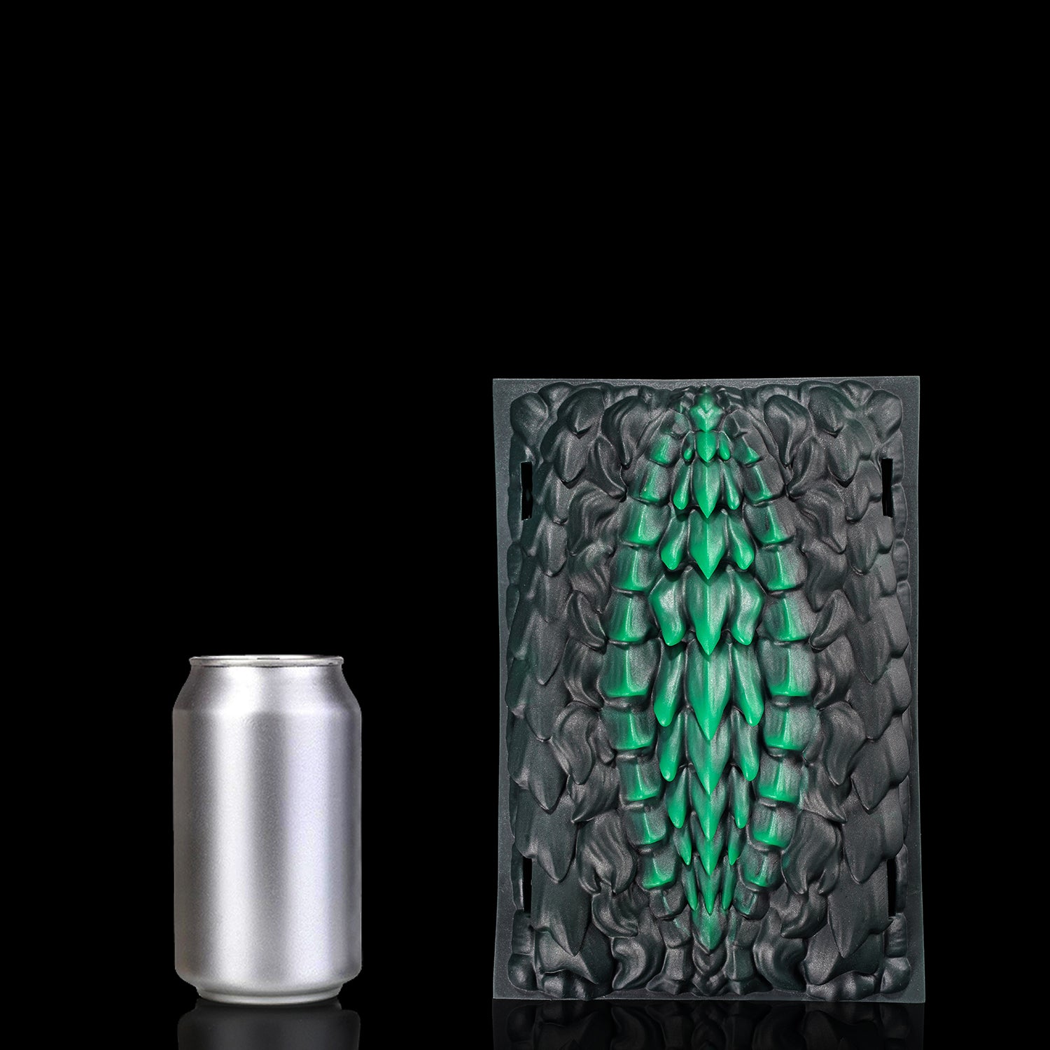 Meo's Scales dragon-scale fantasy grinder with adjustable harness straps - angled front view