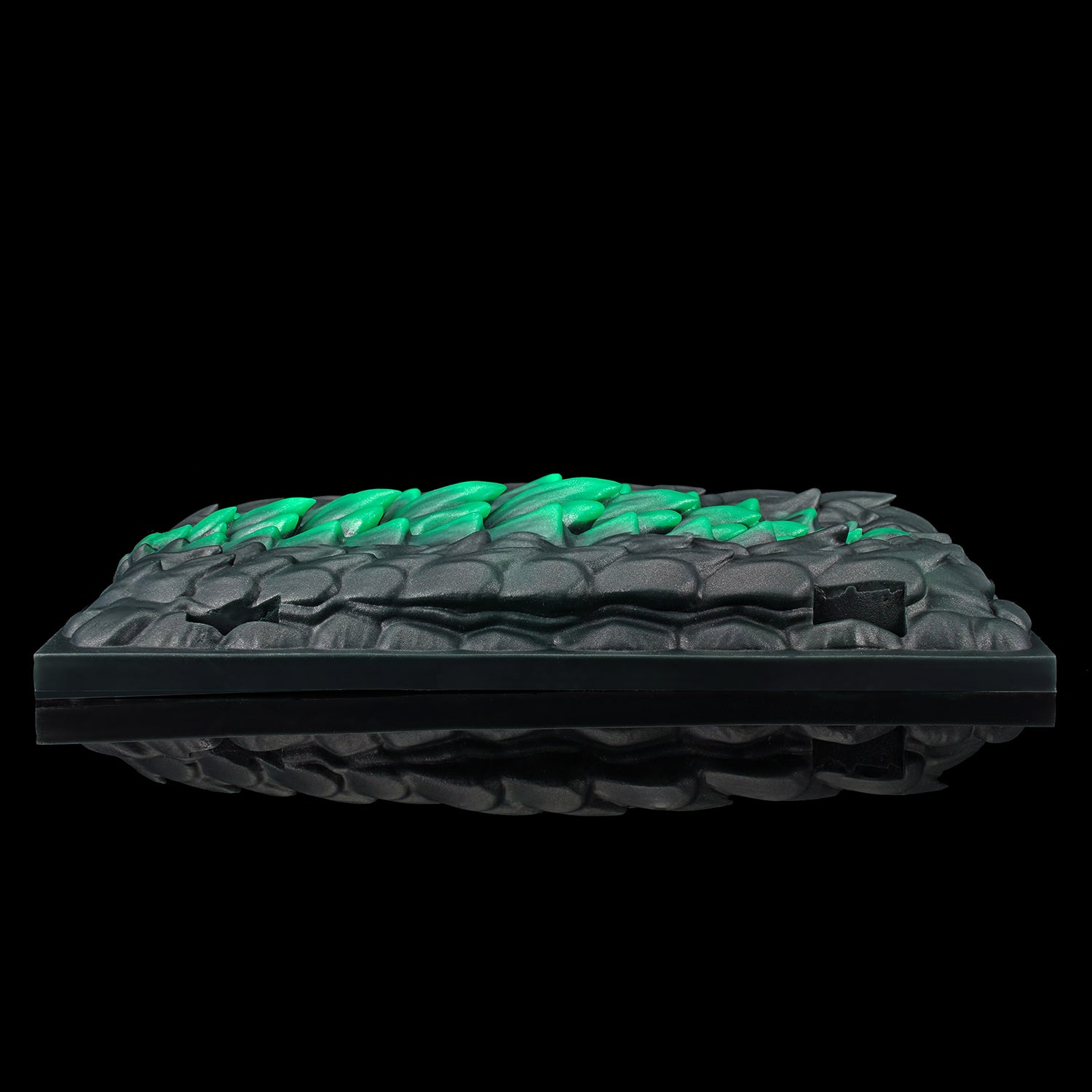 Meo's Scales dragon-scale fantasy grinder with adjustable harness straps - side profile