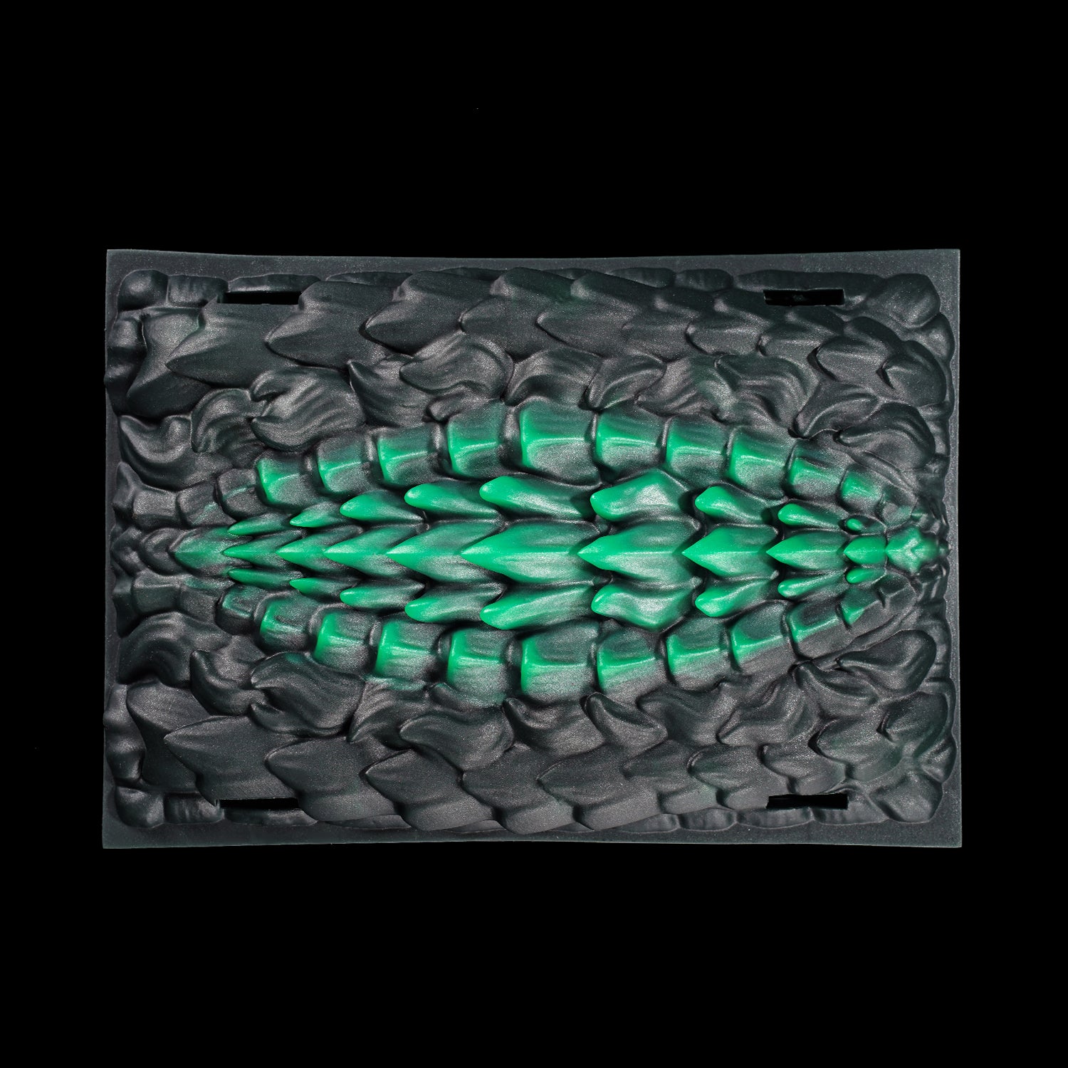 Meo's Scales dragon-scale fantasy grinder with adjustable harness straps - side texture detail