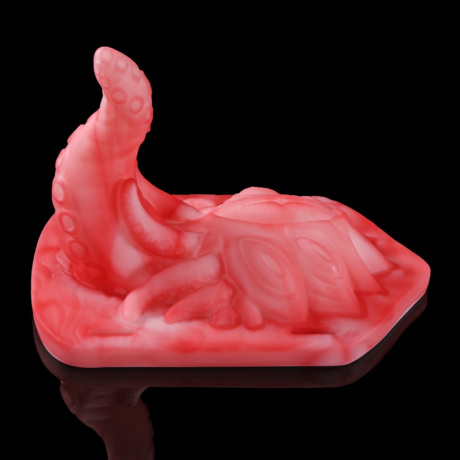 Alla's Gaze fantasy grinder with sculpted tentacles, raised texture, and adjustable harness straps - pink front texture view