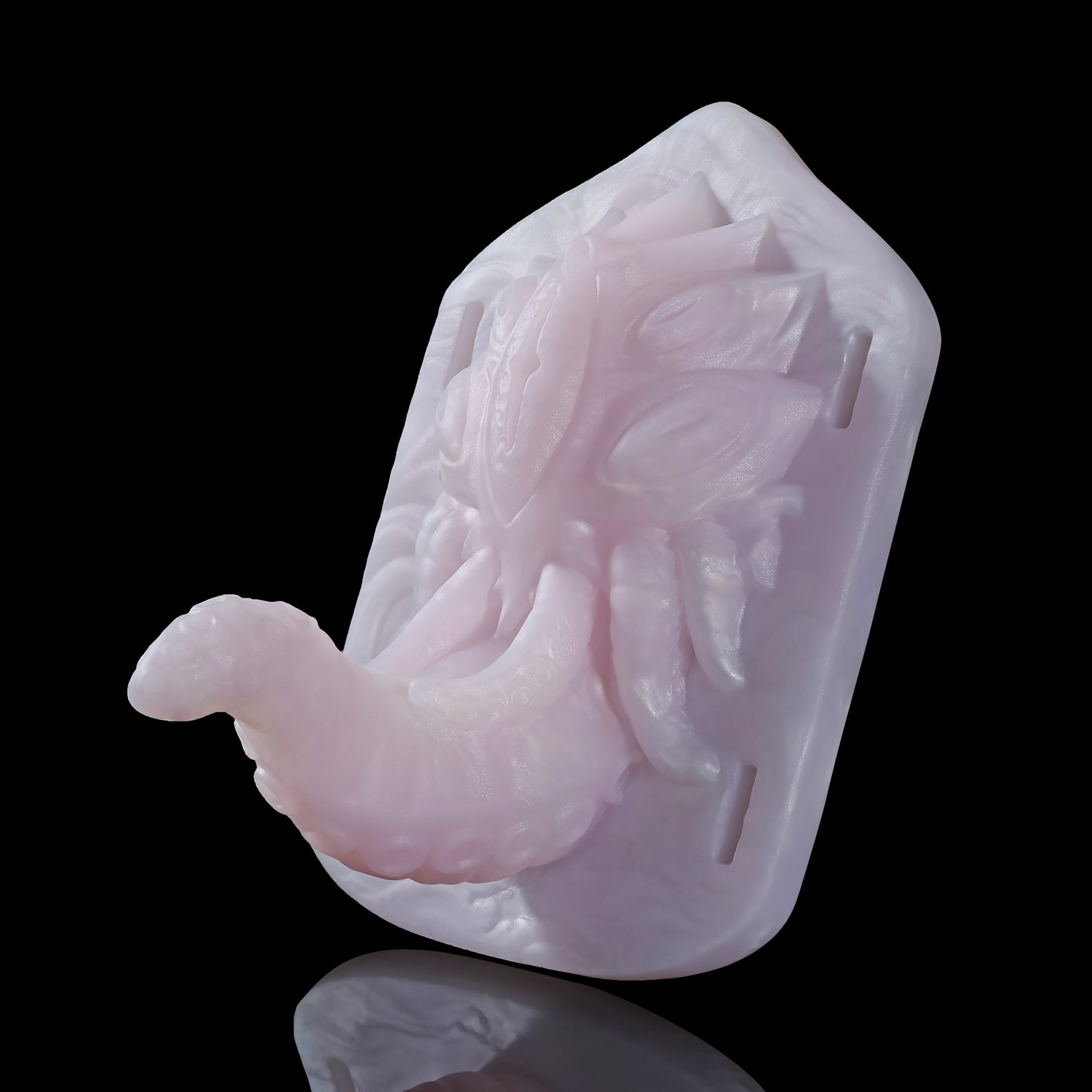 Alla's Gaze fantasy grinder with sculpted tentacles, raised texture, and adjustable harness straps - pink rear view