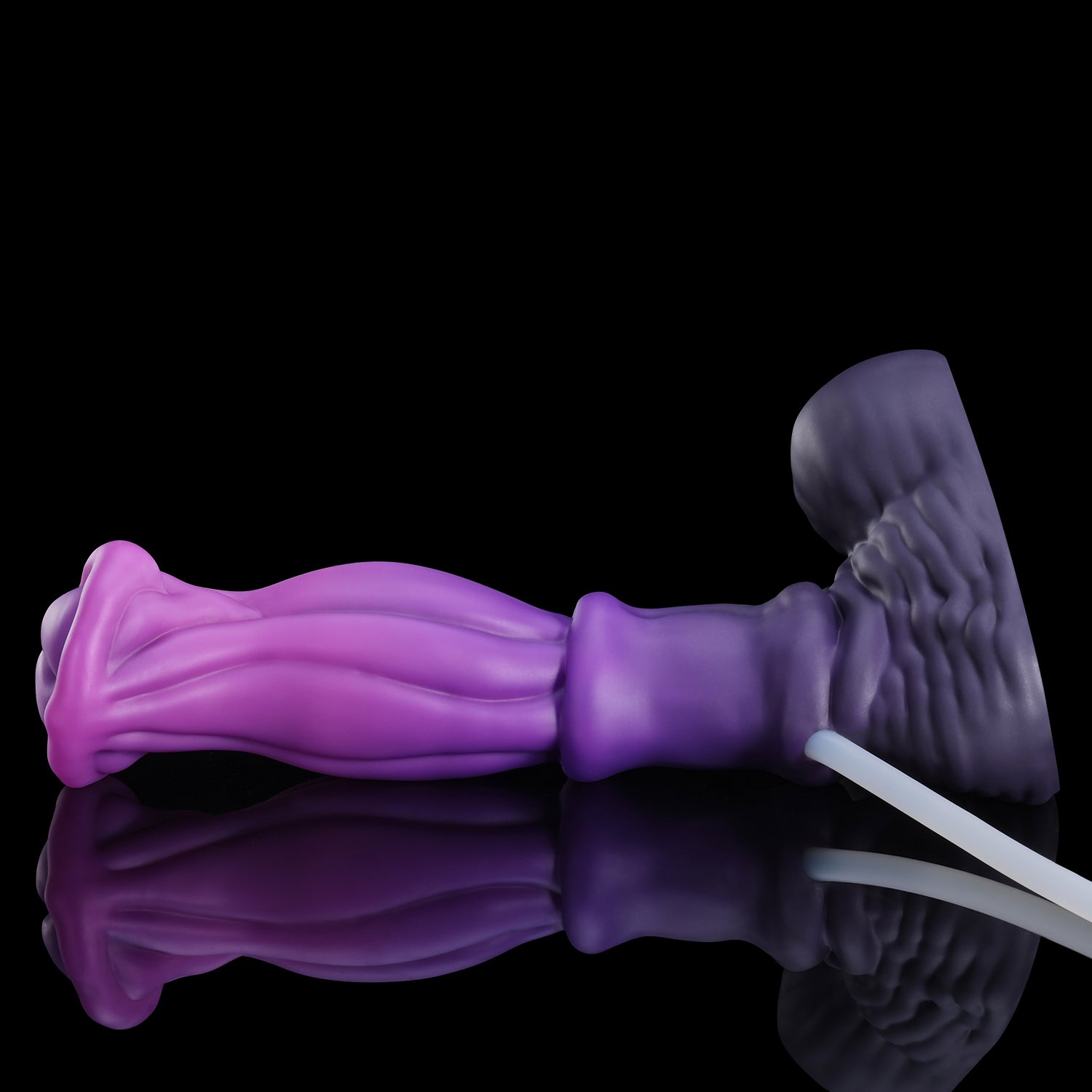 ANUBIS plus tube fantasy ejaculating dildo with a sculpted shaft, flared head, and built-in tube - purple angled view with tube