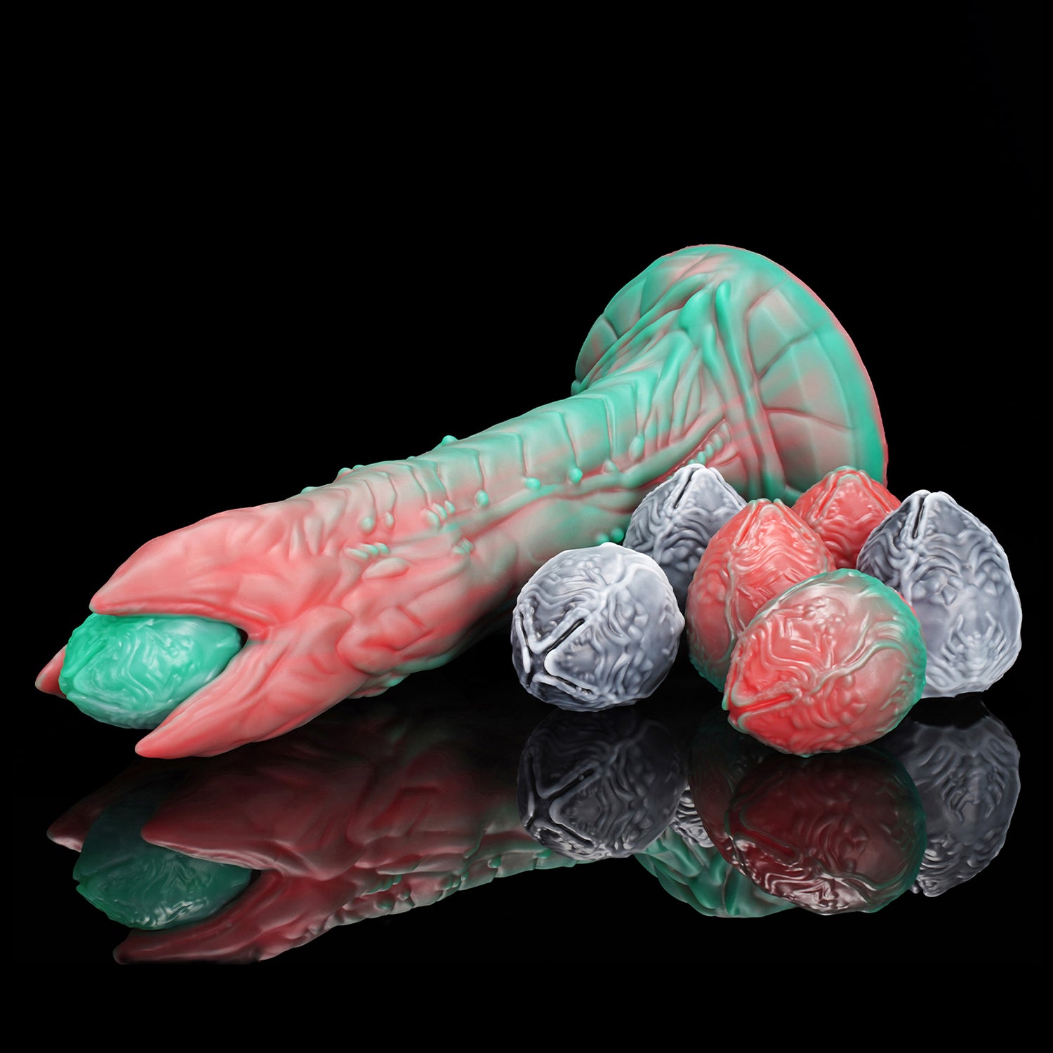 AUDREY II plus OGG fantasy ovipositor dildo with a ridged hollow shaft, OGG egg set, mold, and push rods - angled side view with eggs