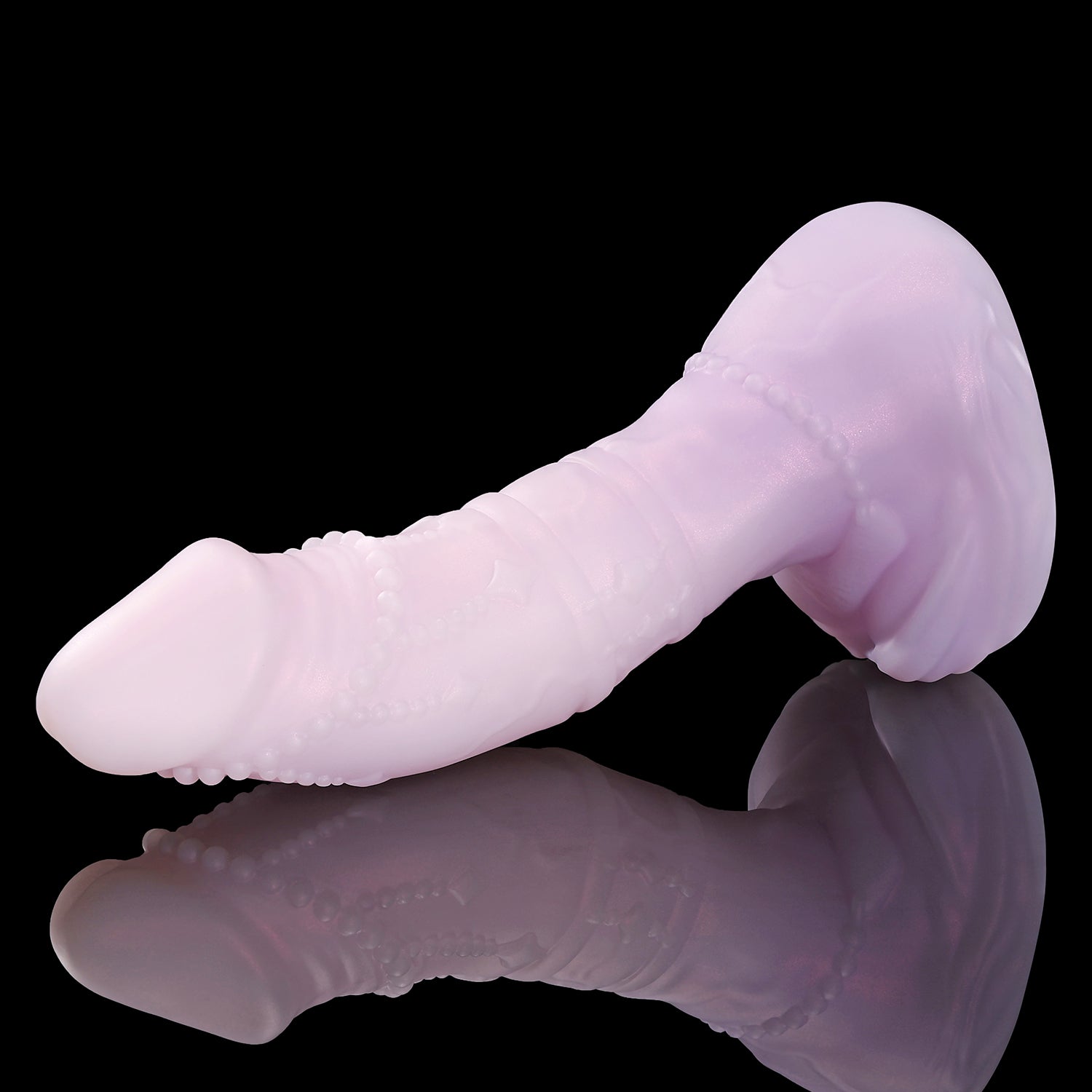 CASTOR fantasy dildo with a gently curved shaft, beaded chain detail, twin rings, and rounded base - pink custom color low side view