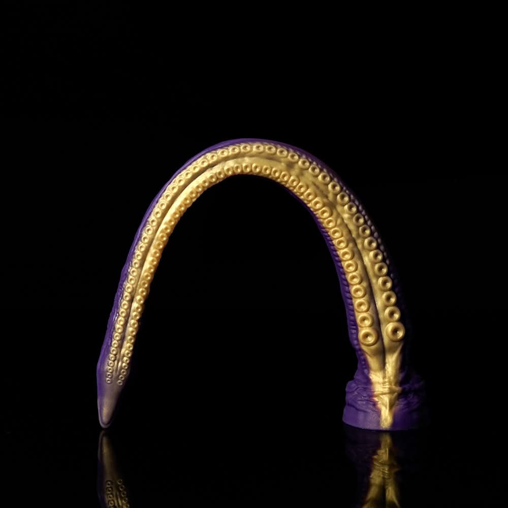 ABYSS II long tentacle dildo with a curved suction-cup texture and flared base - gold custom color coiled view