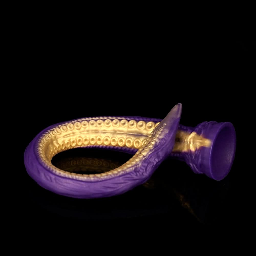 ABYSS II long tentacle dildo with a curved suction-cup texture and flared base - purple custom color coiled view