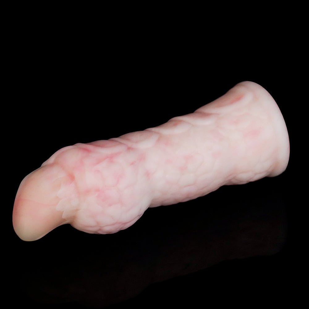 WAT'S FINGER COTS fantasy finger sleeves with sculpted creature-inspired texture - pink textured sleeve side view