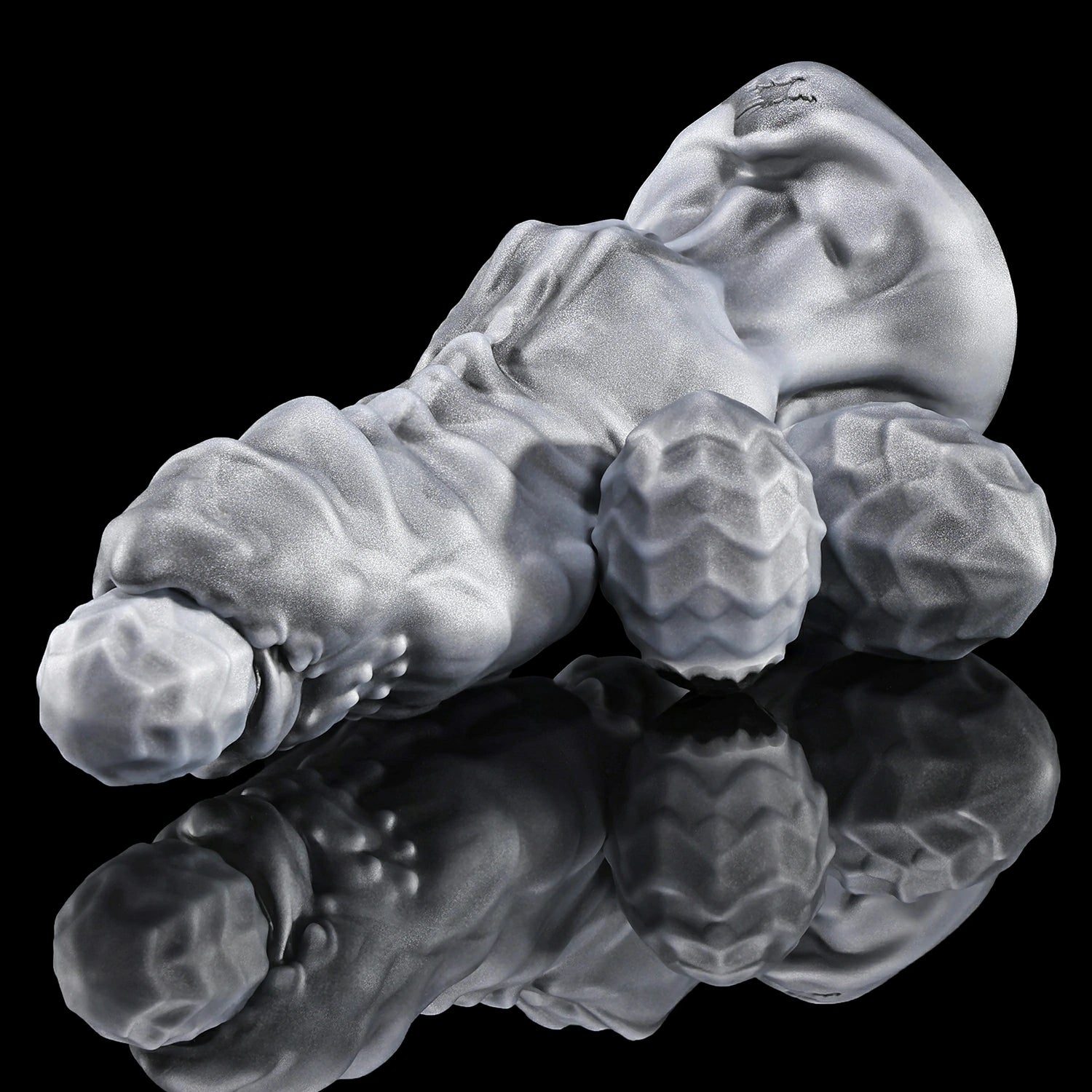  Metallic silver LOCKE ovipositor dildo with a curved insectoid abdomen shape.