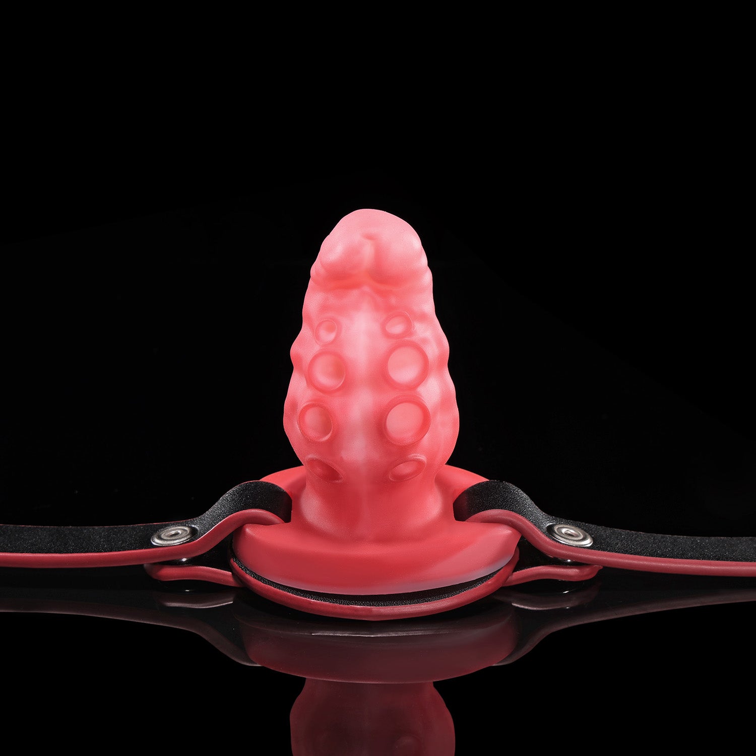 Nothosaur ALLA GAG tentacle mouth gag in pink silicone with adjustable black strap.