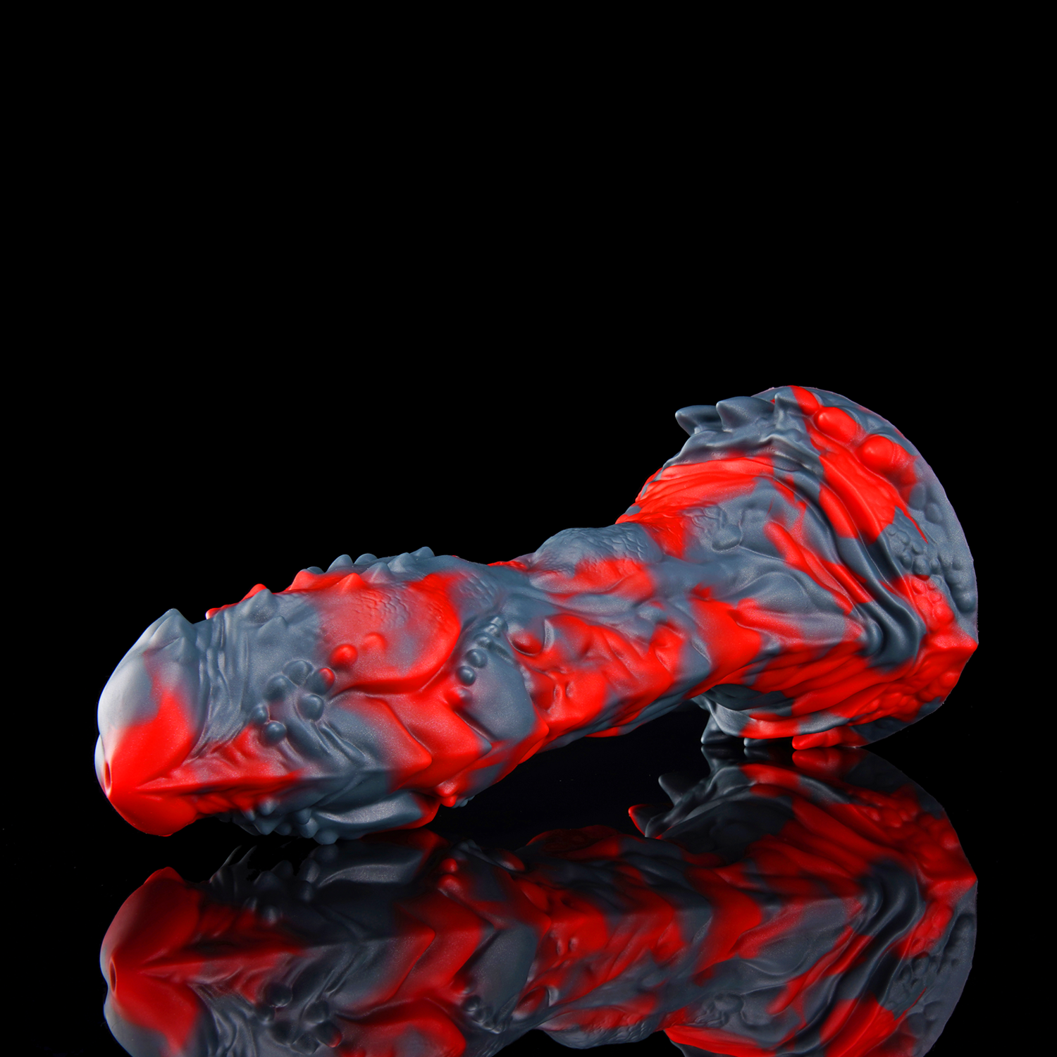 OPALEYE II custom dragon fantasy dildo with layered scale texture and a sculpted base - angled side view
