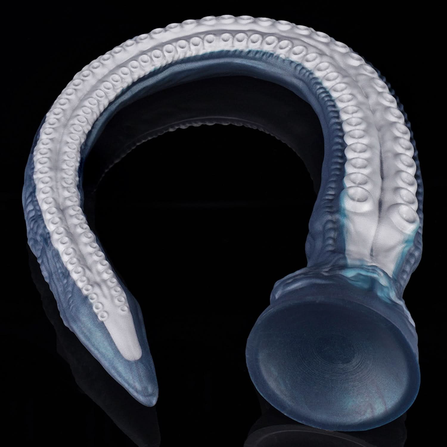 ABYSS II long tentacle dildo with a curved suction-cup texture and flared base - coiled side view