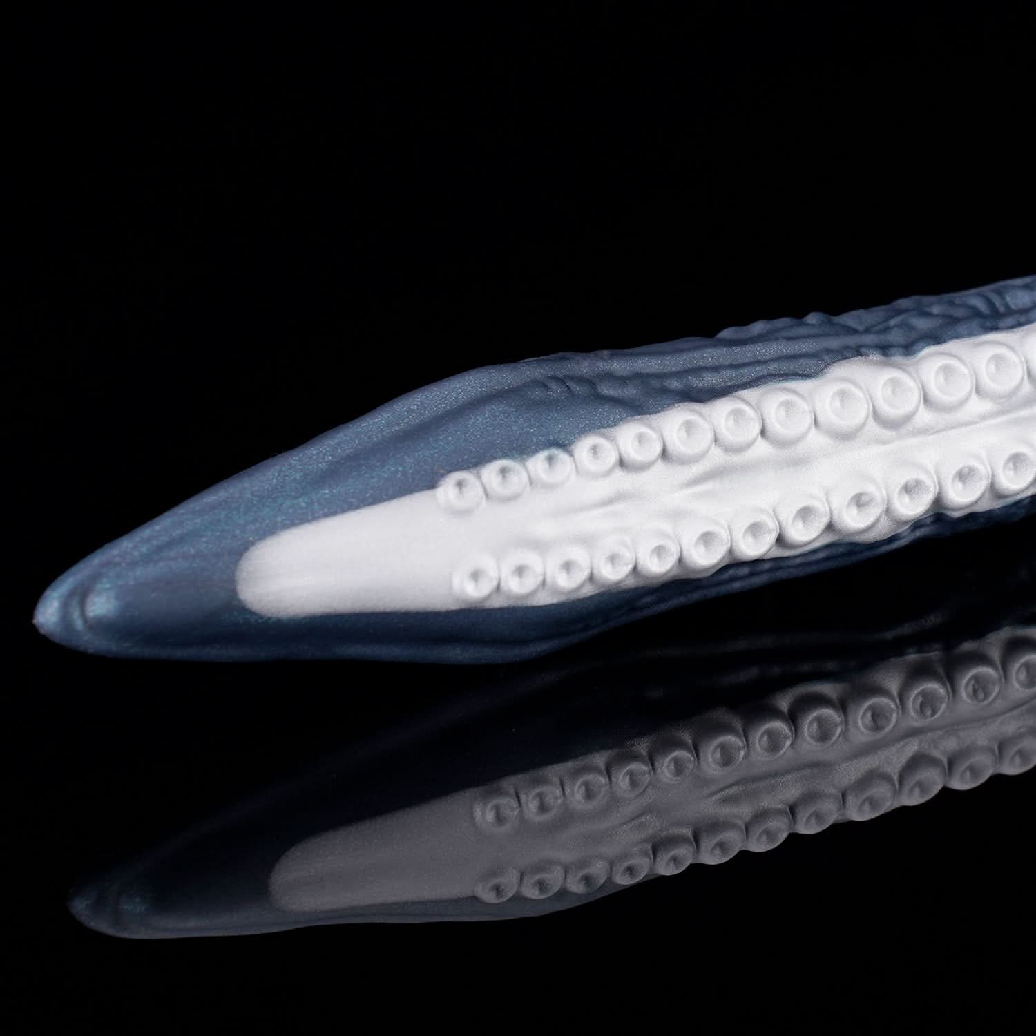 ABYSS II long tentacle dildo with a curved suction-cup texture and flared base - tip and suction-cup detail