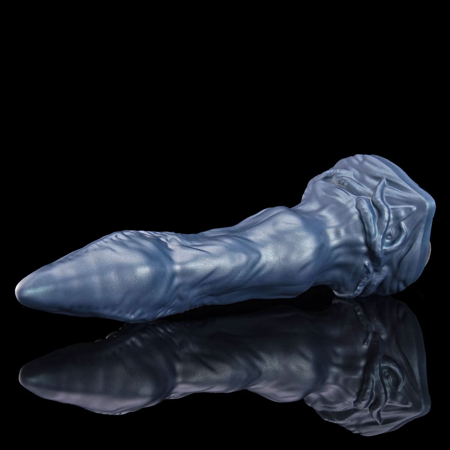 ABYSS tentacle dildo with rows of suction cups and a sculpted fantasy base - low side view