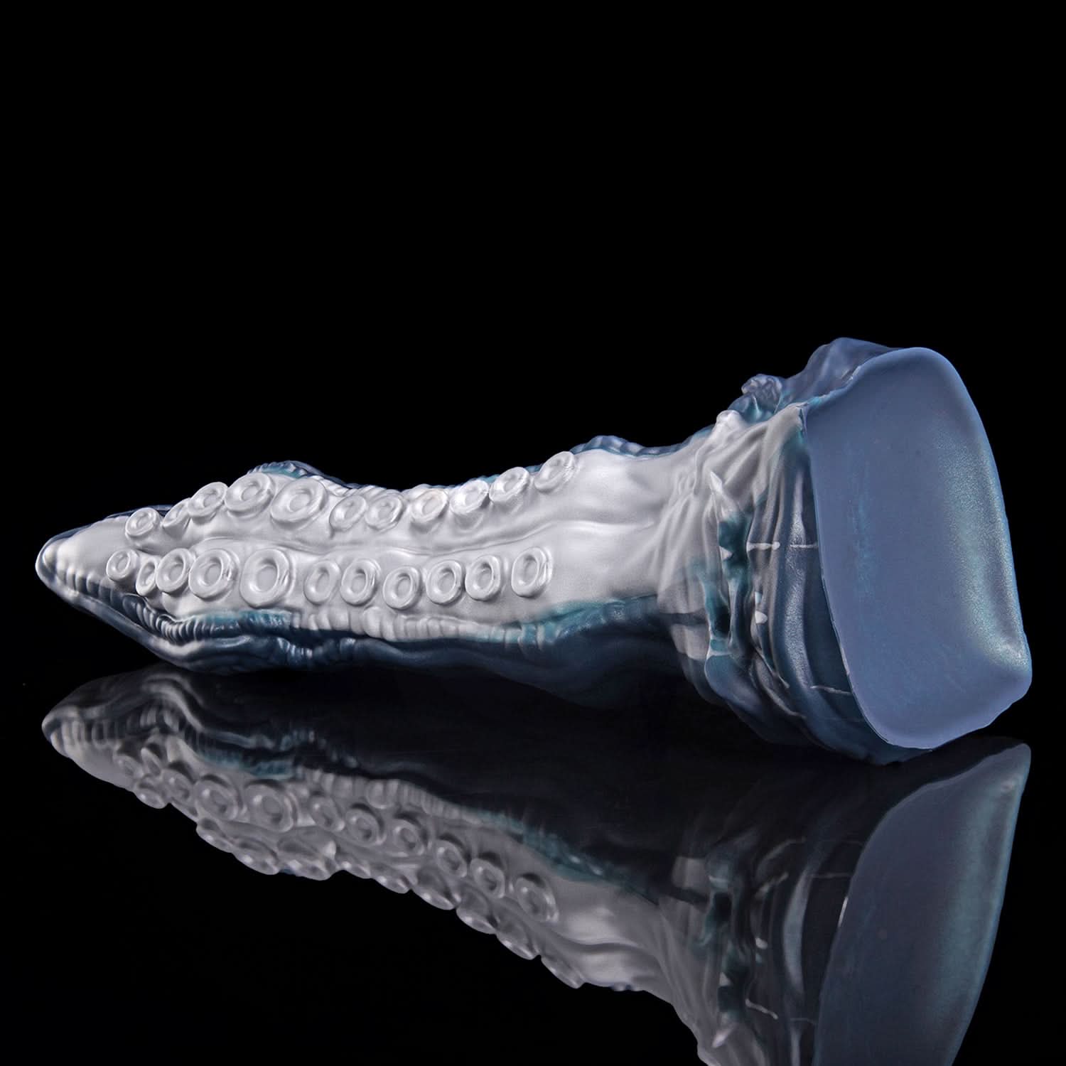 ABYSS tentacle dildo with rows of suction cups and a sculpted fantasy base - top texture view