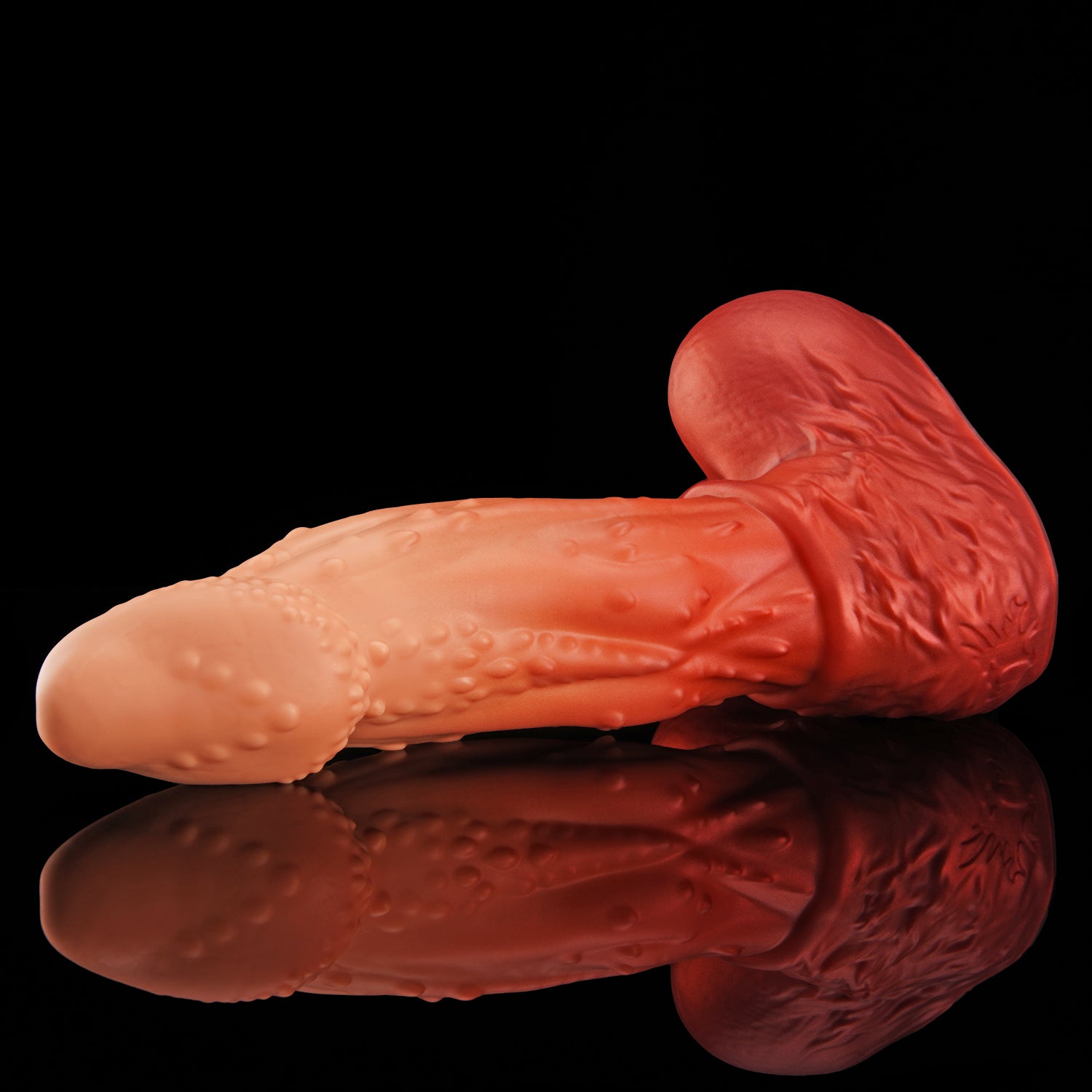 ALCANON fantasy animal dildo with a textured shaft, sculpted head, and rounded balls - low side view