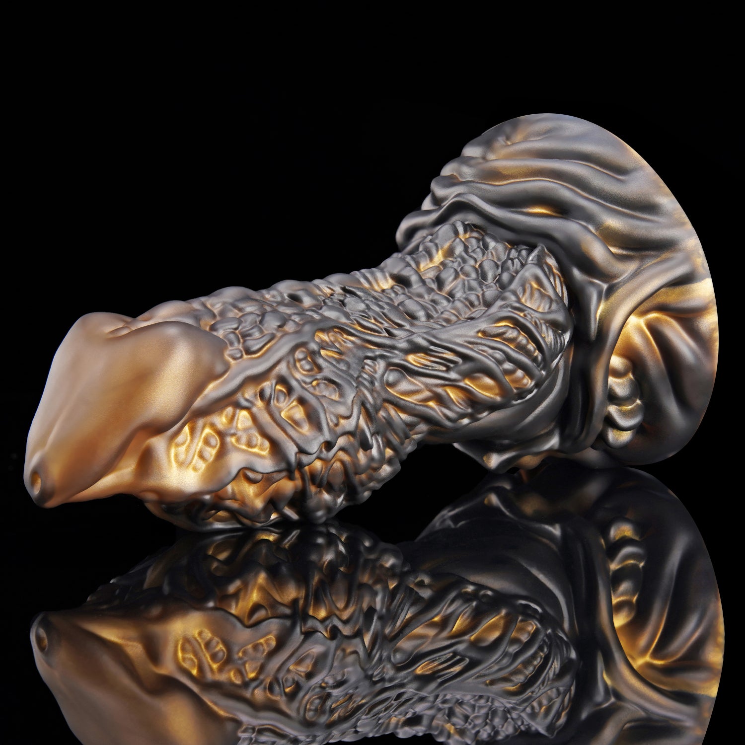 MAGARA custom dragon fantasy dildo with layered scale texture and a sculpted ornamental base - black and gold colorway side view