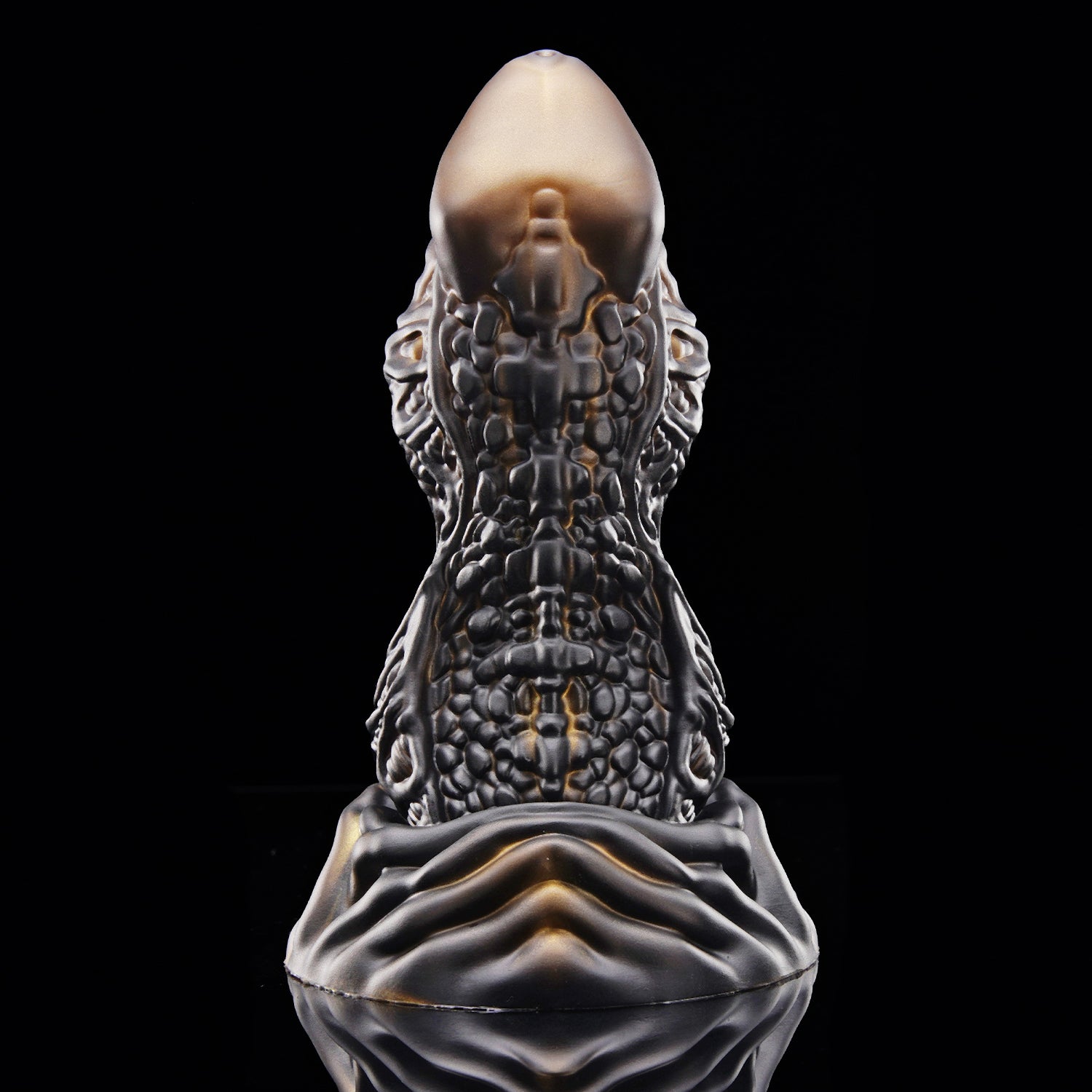 MAGARA custom dragon fantasy dildo with layered scale texture and a sculpted ornamental base - black and gold colorway upright view