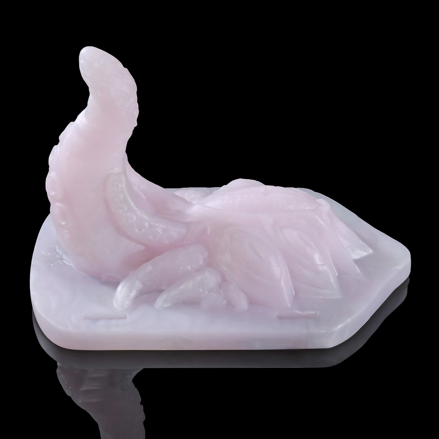 Alla's Gaze fantasy grinder with sculpted tentacles, raised texture, and adjustable harness straps - pink front view