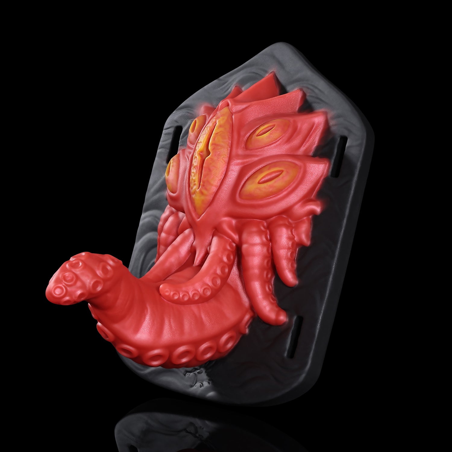 Alla's Gaze fantasy grinder with sculpted tentacles, raised texture, and adjustable harness straps - red angled side view