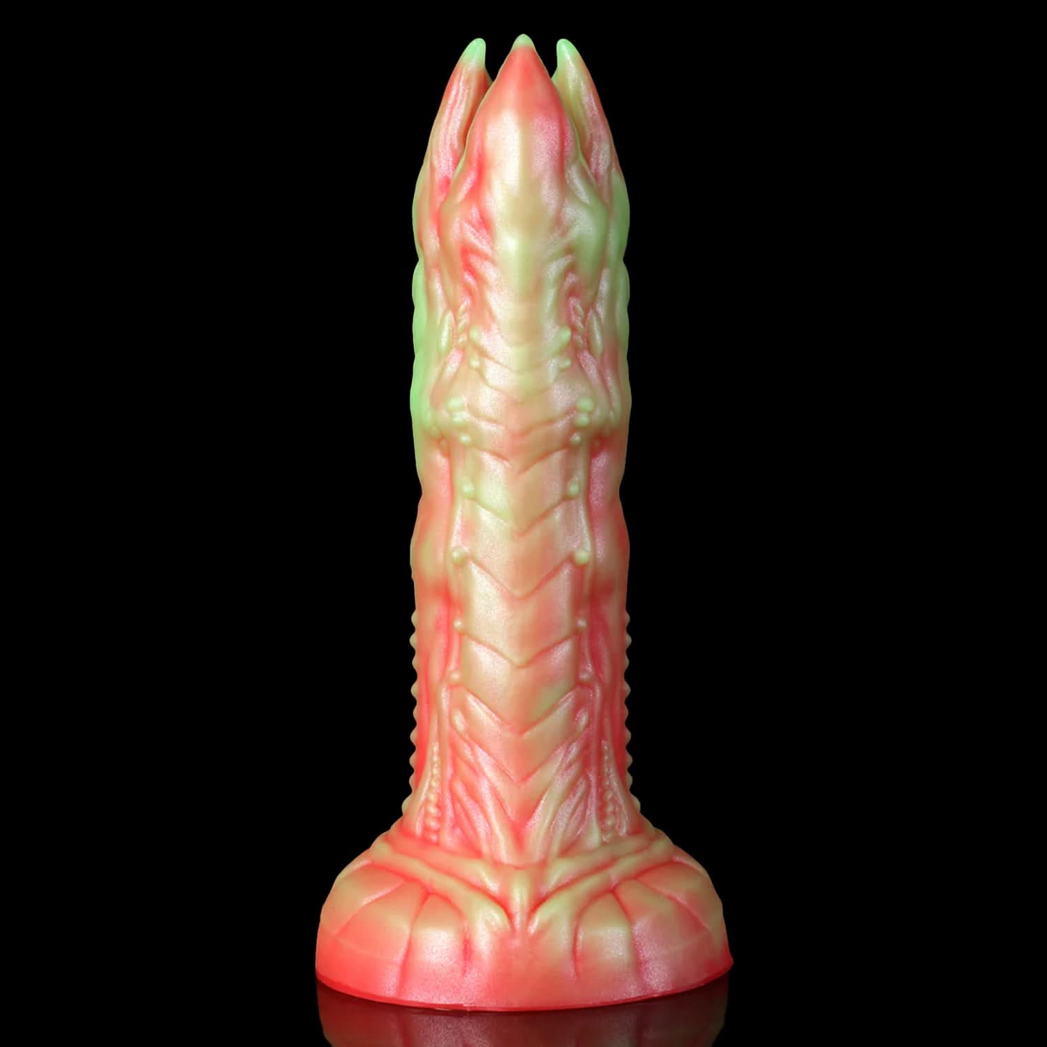 AUDREY II fantasy ovipositor dildo with a ridged hollow shaft, multi-petaled tip, and root-like suction base - low side view
