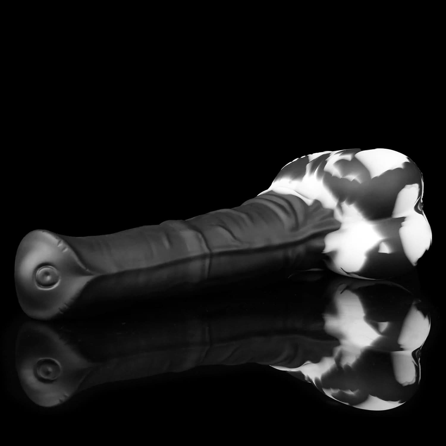 AVOYO fantasy horse dildo with a tapered textured shaft, sculpted base, and rounded balls - black and white custom color angled view