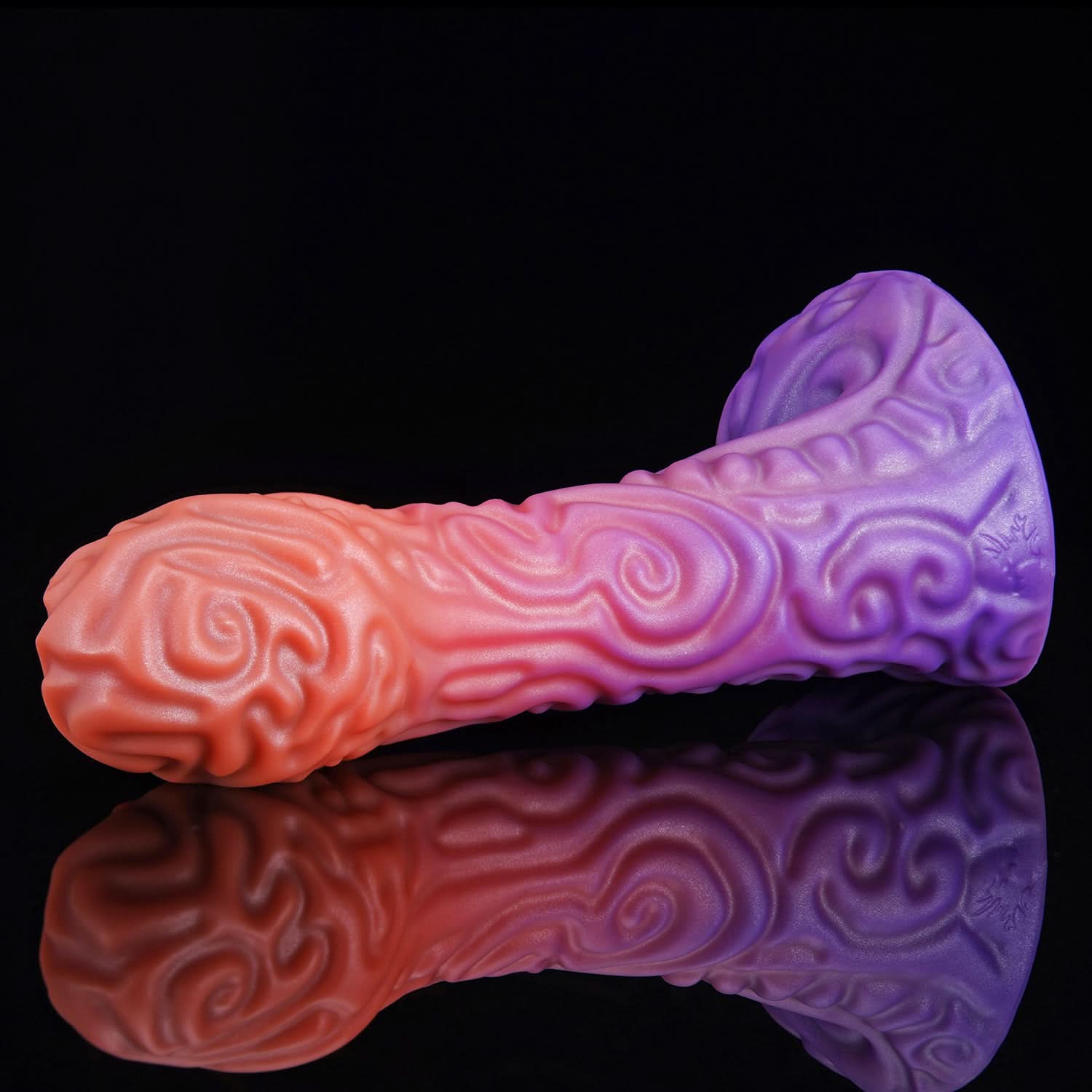 DEVIL FRUIT fantasy fruit dildo with raised spiral texture, a curved shaft, and flared suction-cup base - purple angled view