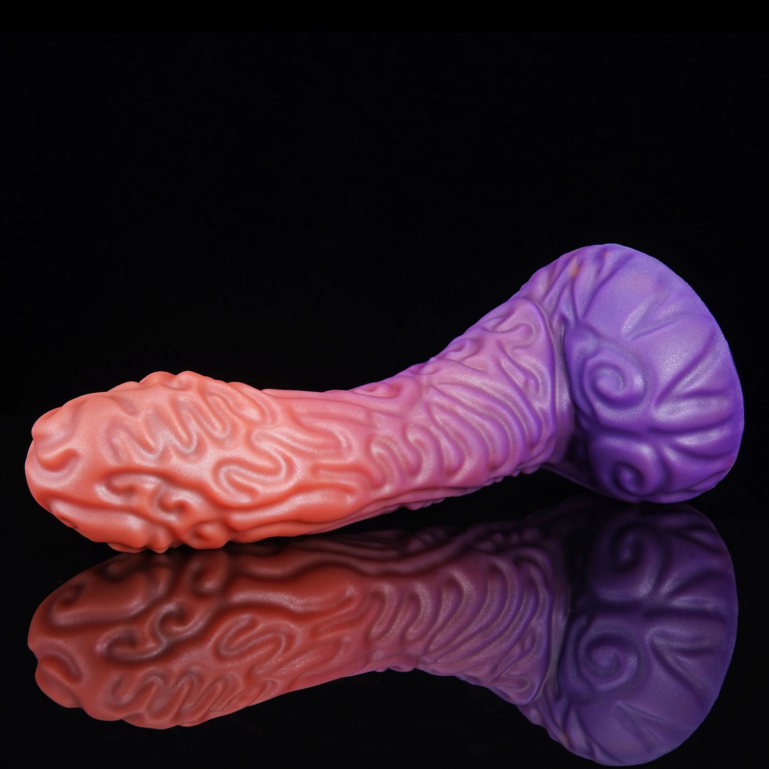 DEVIL FRUIT fantasy fruit dildo with raised spiral texture, a curved shaft, and flared suction-cup base - purple low side view