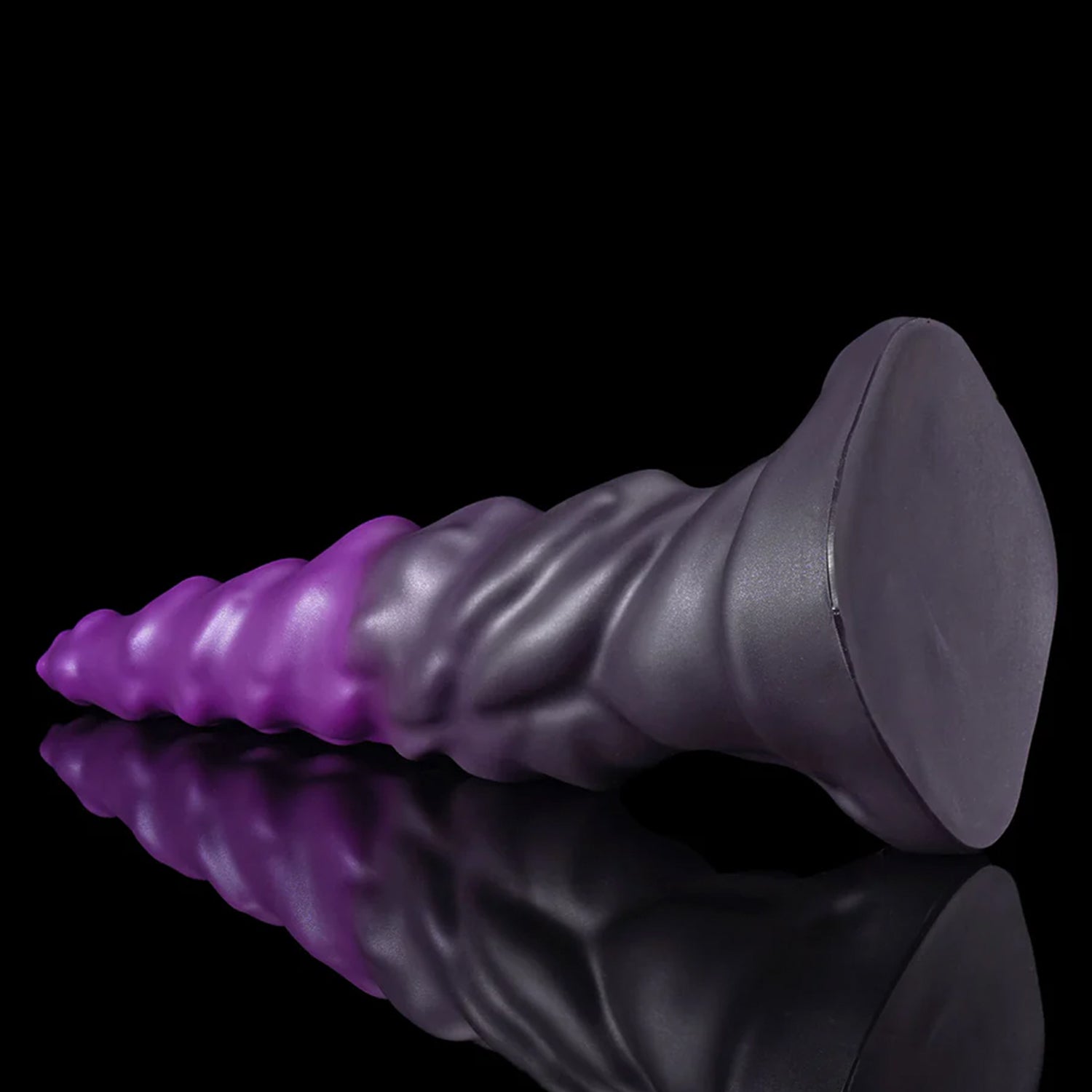 EIN fantasy unicorn dildo with a layered horn texture and wide suction-cup base - purple suction-cup base view