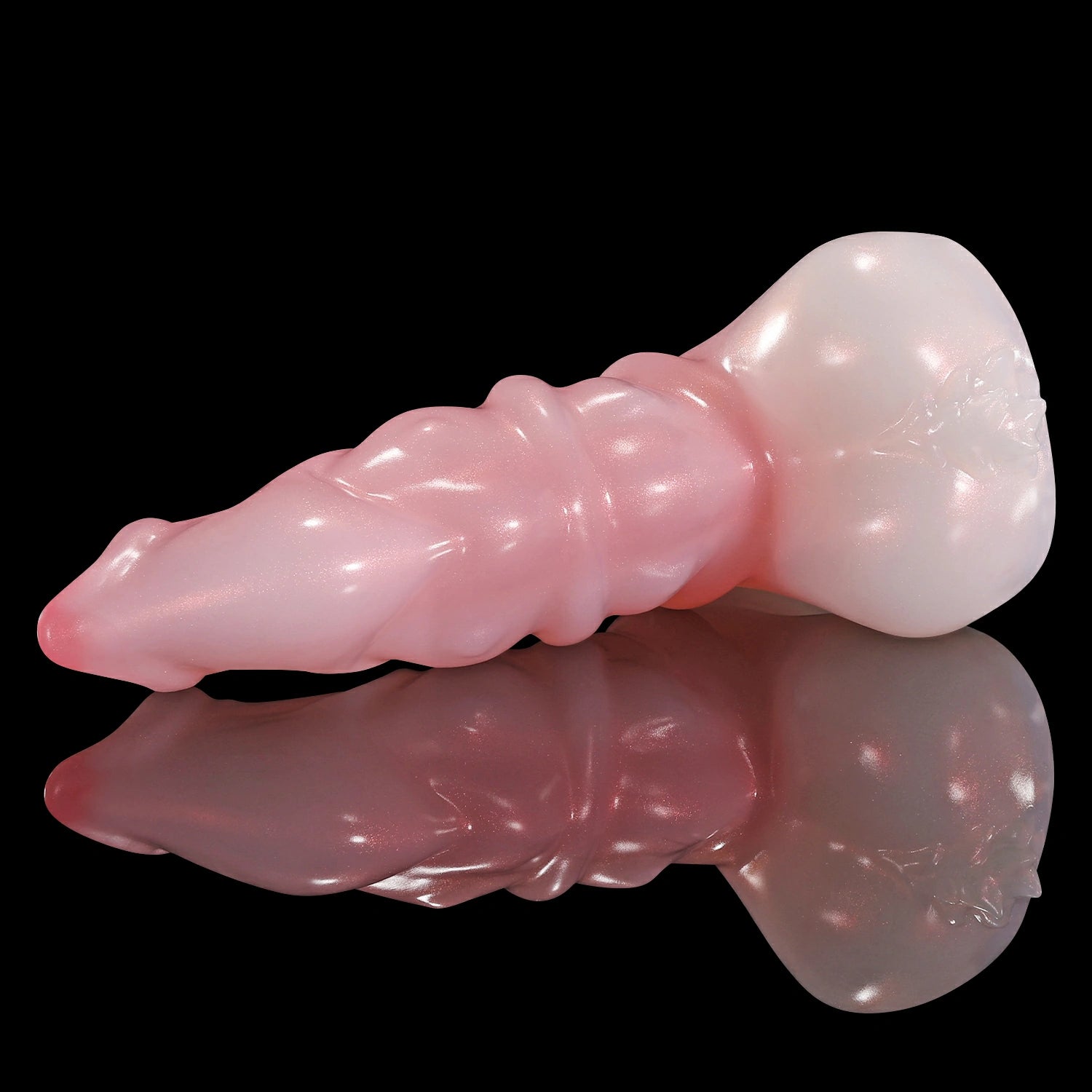 GLOSSY ASMODEUS fantasy smooth dildo with a sculpted tapered shaft, rounded base, and glossy finish - pink low side view