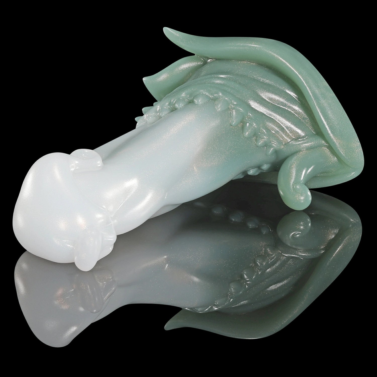GLOSSY BEELZEBUB fantasy dildo with a rounded head, tendril-like details, serrated texture, and glossy finish - green and white custom color low side view