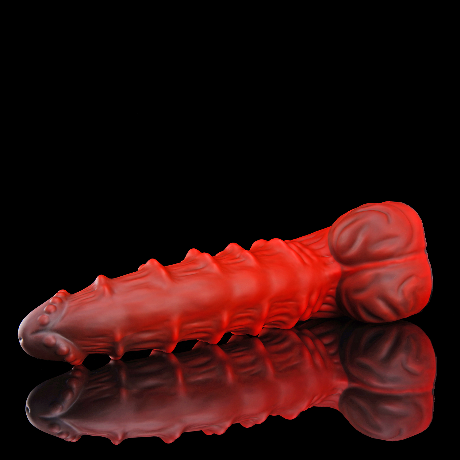 Nothosaur MEPHISTO fantasy monster dildo with an upturned tip and layered rounded ridges - side view