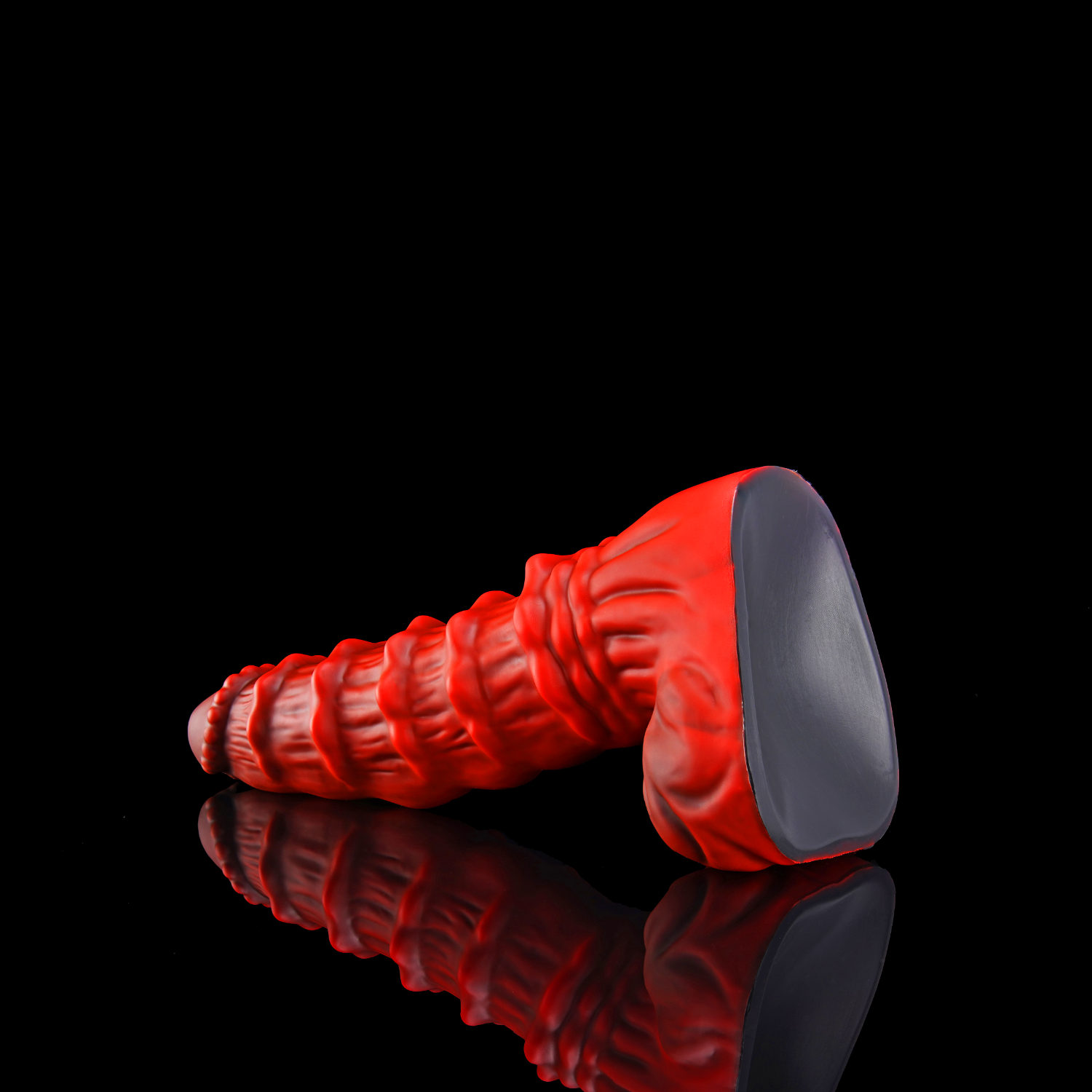 Nothosaur MEPHISTO fantasy monster dildo with an upturned tip and layered rounded ridges - suction cup base view