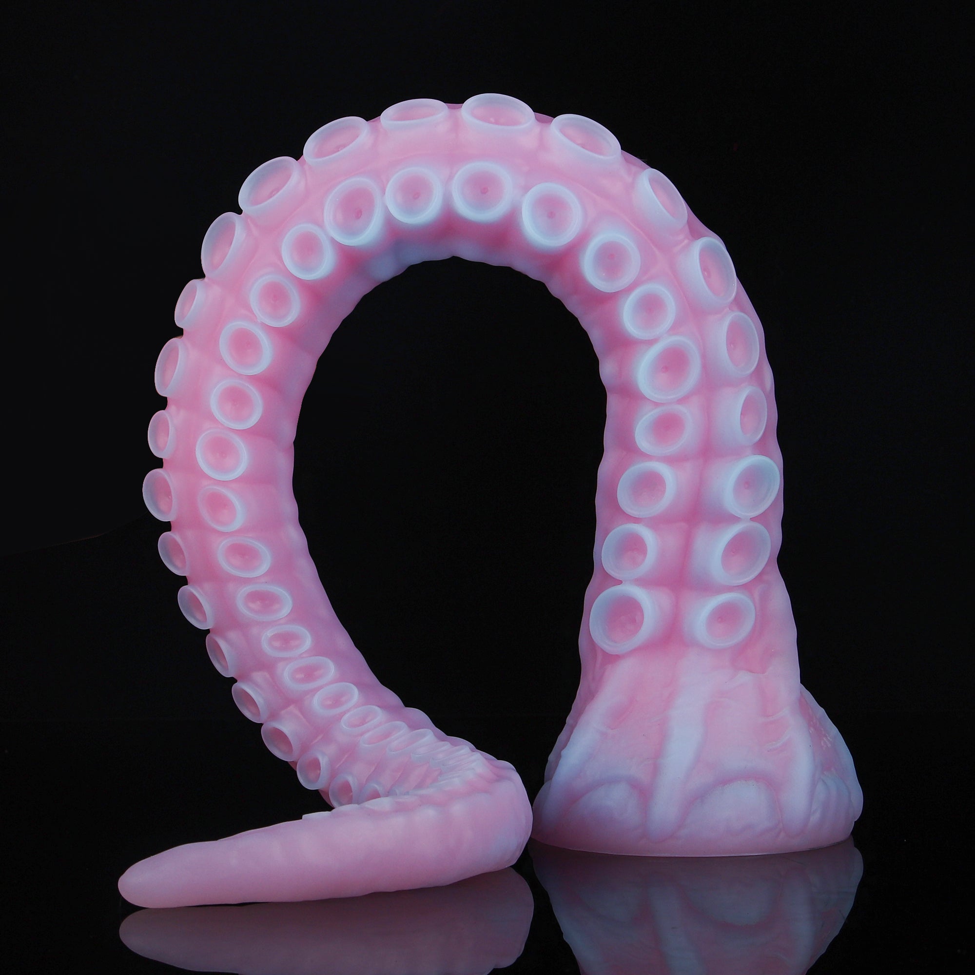 ALLA curved tentacle dildo with raised suction cups and sculpted flared base - pink custom color coiled view