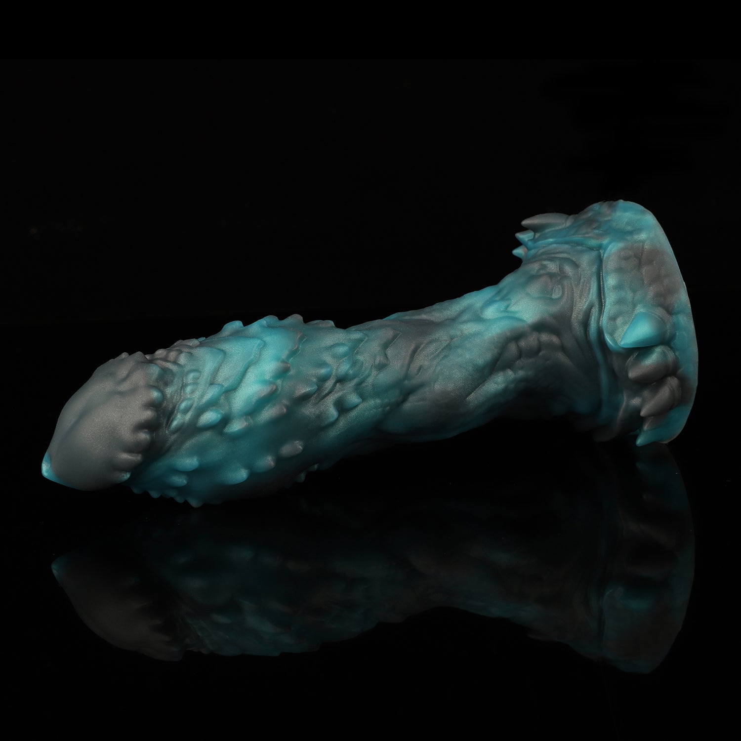 OPALEYE II custom dragon fantasy dildo with layered scale texture and a sculpted base - green colorway side view